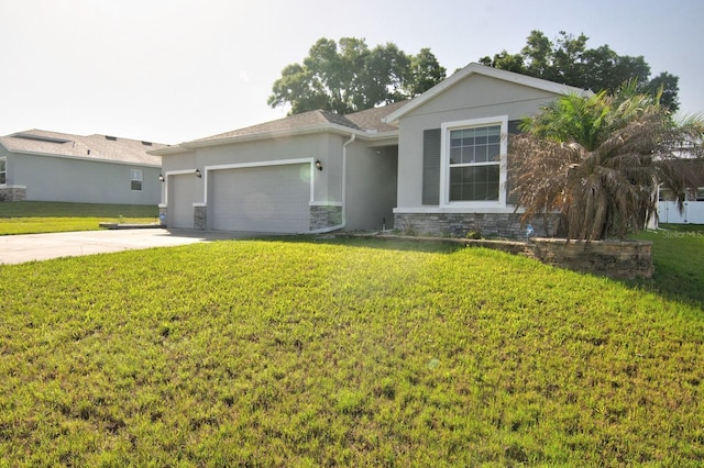 4261 SW 62nd Loop, Ocala, FL 34474 - ranch-style home featuring a garage, stucco siding, a front yard, concrete driveway, and stone siding