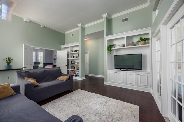 5802 SW 89th Ter, Gainesville, FL 32608 - living area featuring a high ceiling, ornamental molding, dark wood-style flooring, and baseboards