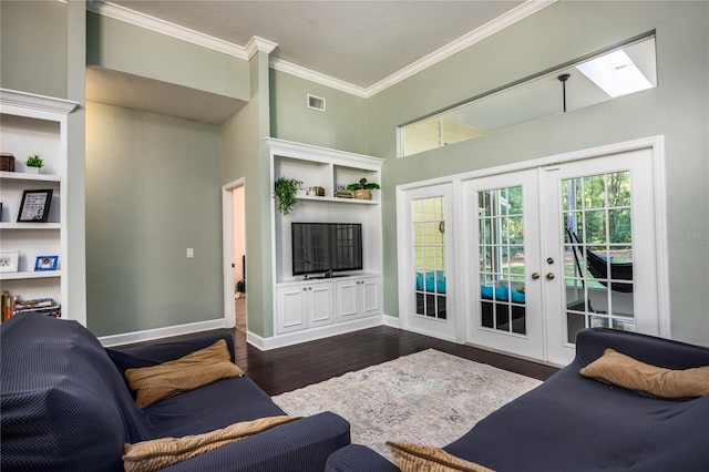 5802 SW 89th Ter, Gainesville, FL 32608 - living area with crown molding, dark wood-type flooring, french doors, baseboards, and a skylight