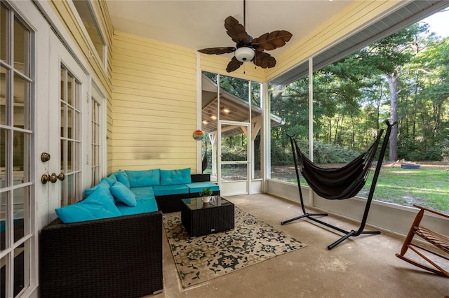 5802 SW 89th Ter, Gainesville, FL 32608 - sunroom featuring french doors, a ceiling fan, an outdoor hangout area, and plenty of natural light