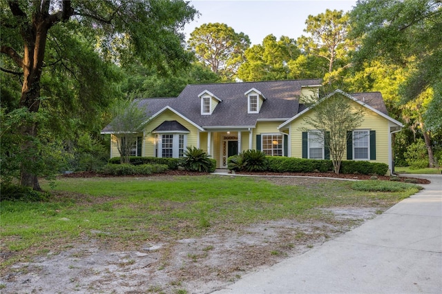 5802 SW 89th Ter, Gainesville, FL 32608 - new england style home with a front yard