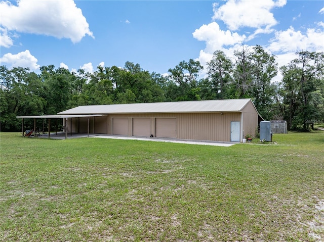 8968 122nd St, Live Oak, FL 32060 - view of pole building featuring a lawn and view of scattered trees