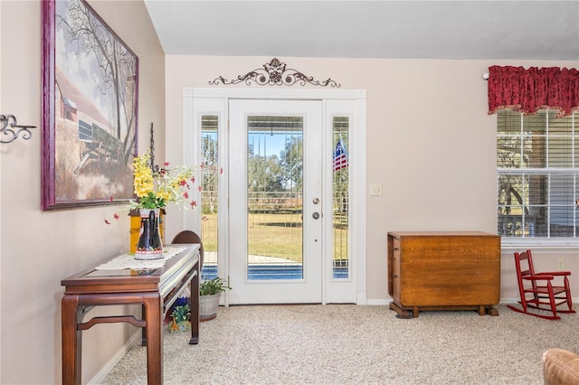 8968 122nd St, Live Oak, FL 32060 - doorway featuring carpet and baseboards