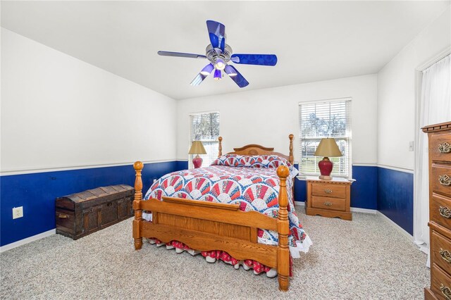 8968 122nd St, Live Oak, FL 32060 - carpeted bedroom featuring multiple windows, baseboards, and a ceiling fan