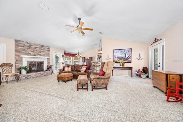 8968 122nd St, Live Oak, FL 32060 - carpeted living room with vaulted ceiling, a ceiling fan, and a brick fireplace