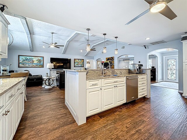 1120 81st St S, Saint Petersburg, FL 33707 - kitchen featuring a ceiling fan, arched walkways, dishwasher, dark wood-style floors, and a sink