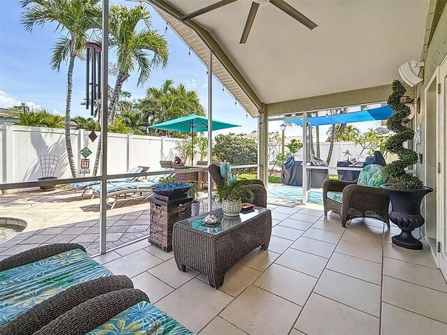 1120 81st St S, Saint Petersburg, FL 33707 - view of patio / terrace featuring ceiling fan, a fenced backyard, an outdoor living space, and outdoor dining space