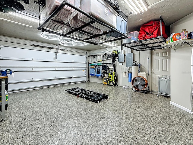1120 81st St S, Saint Petersburg, FL 33707 - garage with electric panel and baseboards