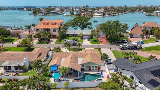 1120 81st St S, Saint Petersburg, FL 33707 - aerial view of residential area with a large body of water and a pool