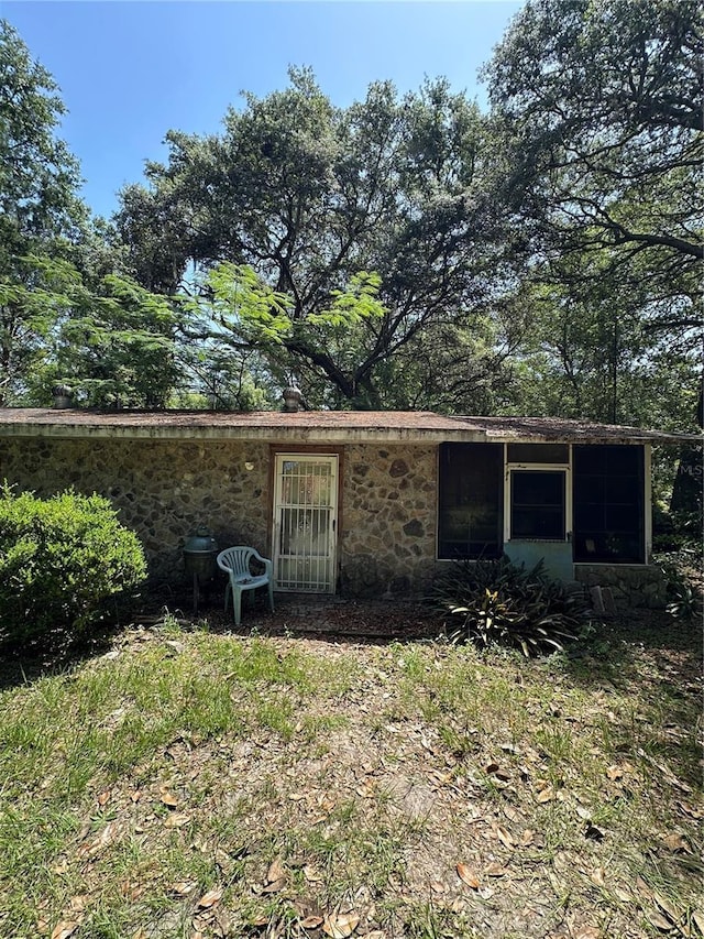 15750 NE 150th Ter, Fort Mc Coy, FL 32134 - back of property featuring stone siding