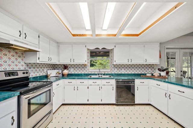 3233 SW 125th St, Archer, FL 32618 - kitchen featuring stainless steel range with electric stovetop, under cabinet range hood, black dishwasher, a sink, and dark countertops