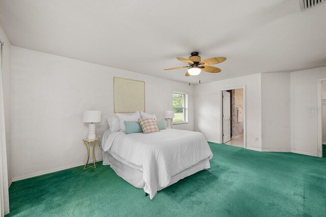 3233 SW 125th St, Archer, FL 32618 - bedroom with carpet flooring, baseboards, and ceiling fan