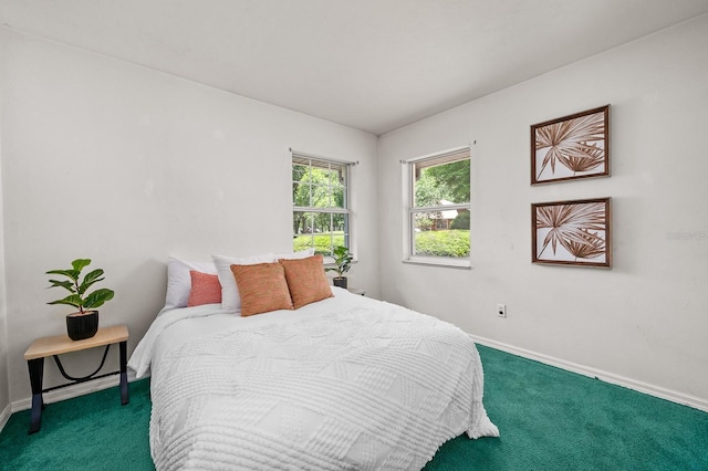 3233 SW 125th St, Archer, FL 32618 - carpeted bedroom featuring baseboards