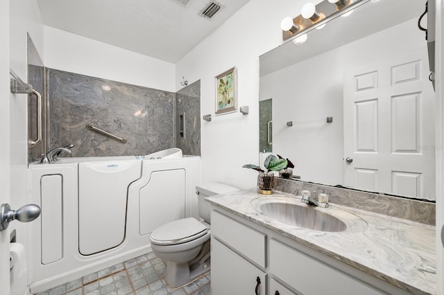 3233 SW 125th St, Archer, FL 32618 - full bathroom featuring vanity and toilet