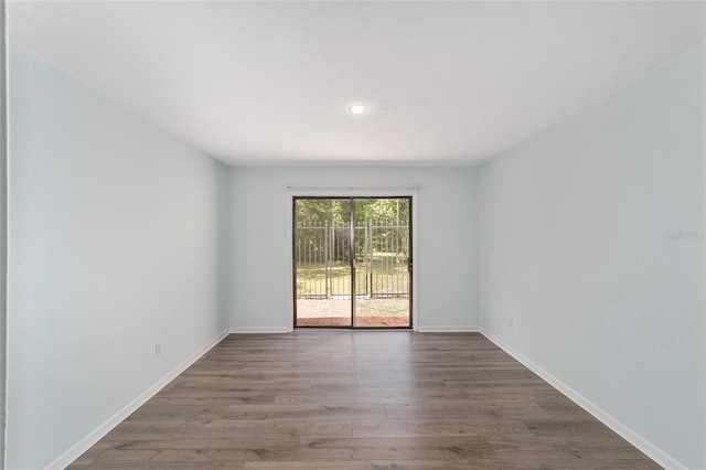 13207 SW Williston Rd, Micanopy, FL 32667 - empty room with wood finished floors, baseboards, and recessed lighting