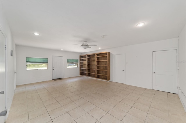 13207 SW Williston Rd, Micanopy, FL 32667 - unfurnished living room with ceiling fan, recessed lighting, and light tile patterned floors