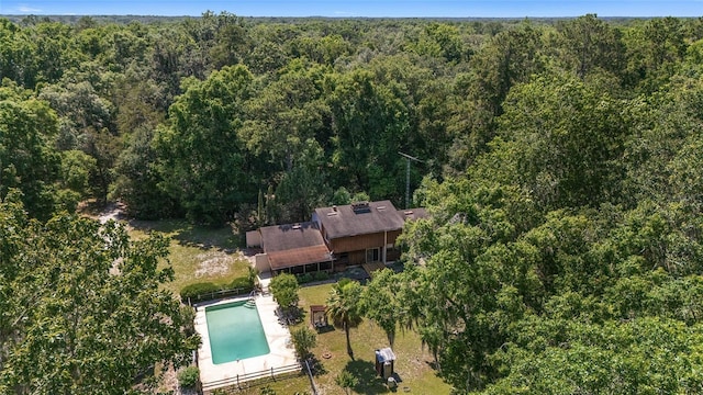 13207 SW Williston Rd, Micanopy, FL 32667 - view from above of property with a heavily wooded area and a pool area