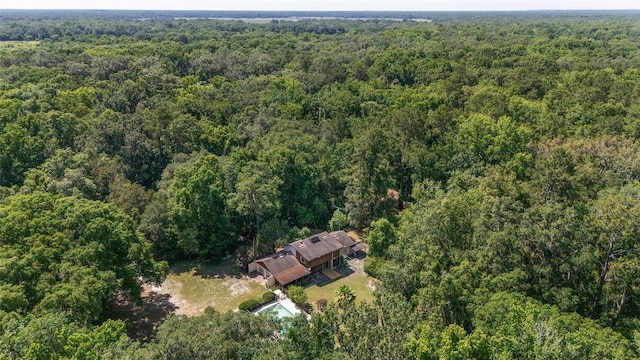 13207 SW Williston Rd, Micanopy, FL 32667 - view from above of property with a forest