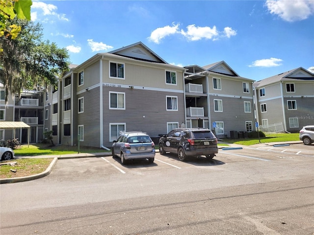 4000 SW 23rd St Unit 3-305, Gainesville, FL 32608 - view of property featuring uncovered parking