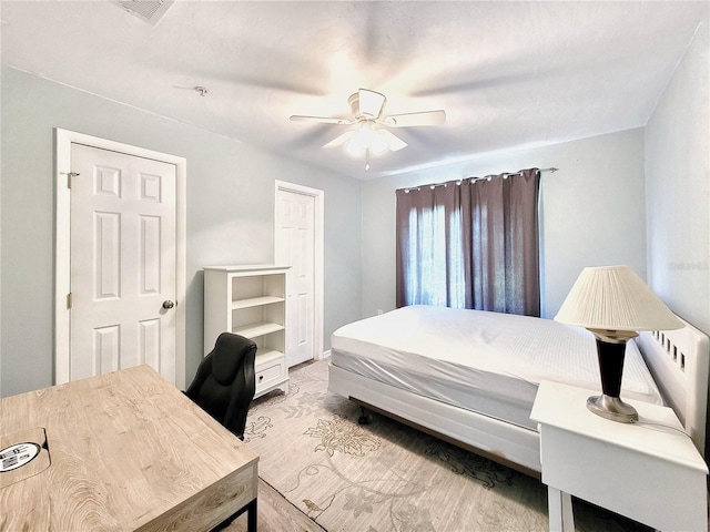 4000 SW 23rd St Unit 3-305, Gainesville, FL 32608 - bedroom featuring a ceiling fan