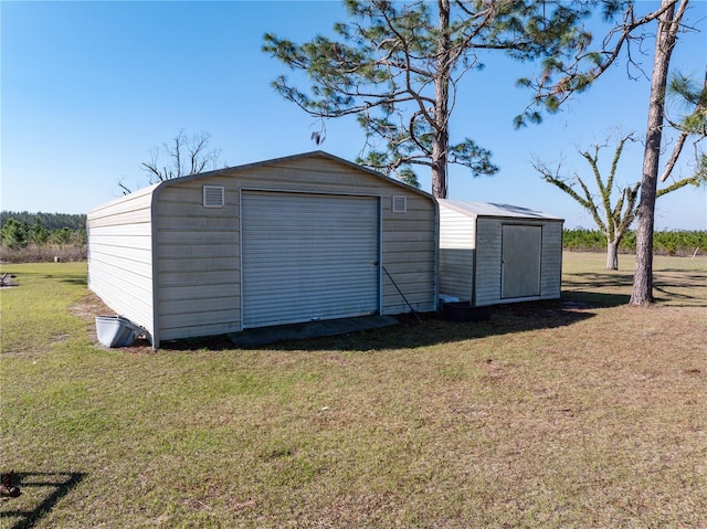 1058 NW County Road 290, Mayo, FL 32066 - detached garage with a storage shed