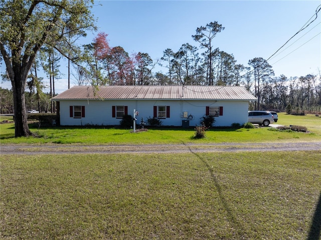 1058 NW County Road 290, Mayo, FL 32066 - single story home featuring a front lawn and metal roof