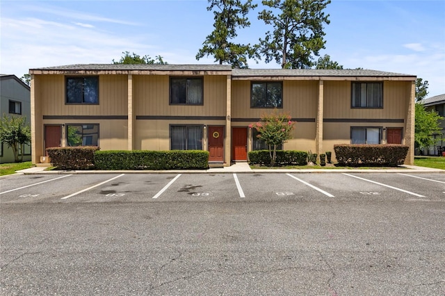 2300 SW 43rd St Unit Q2, Gainesville, FL 32607 - view of building exterior featuring uncovered parking