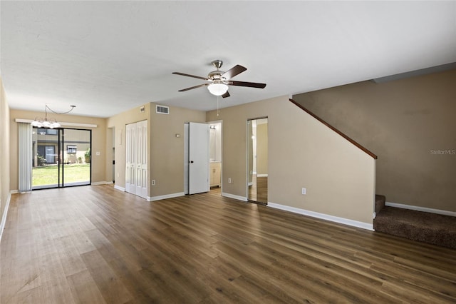 2300 SW 43rd St Unit Q2, Gainesville, FL 32607 - unfurnished living room featuring baseboards, a chandelier, ceiling fan, and wood finished floors