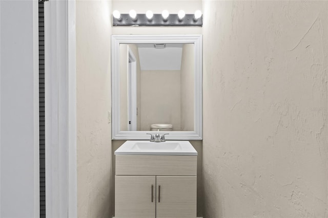 2300 SW 43rd St Unit Q2, Gainesville, FL 32607 - half bath with vanity and a textured wall