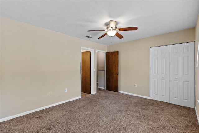 2300 SW 43rd St Unit Q2, Gainesville, FL 32607 - unfurnished bedroom featuring carpet flooring, baseboards, a closet, and ceiling fan