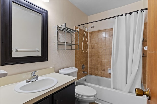 2300 SW 43rd St Unit Q2, Gainesville, FL 32607 - bathroom with shower / tub combo, vanity, toilet, and a textured wall
