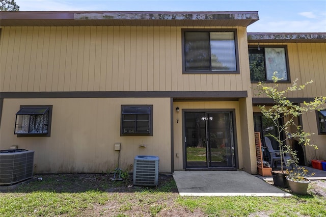 2300 SW 43rd St Unit Q2, Gainesville, FL 32607 - back of property with central AC unit