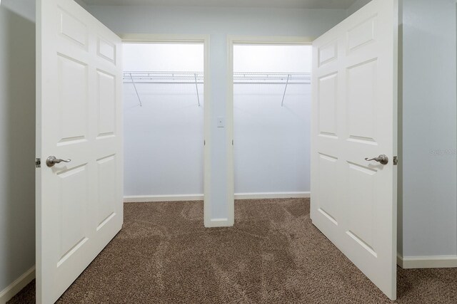 3046 SE 134th St, Starke, FL 32091 - walk in closet featuring dark colored carpet