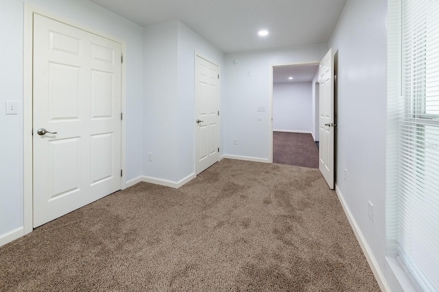 3046 SE 134th St, Starke, FL 32091 - unfurnished bedroom with carpet flooring, recessed lighting, and baseboards