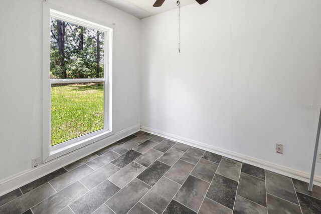 3046 SE 134th St, Starke, FL 32091 - spare room with ceiling fan and baseboards