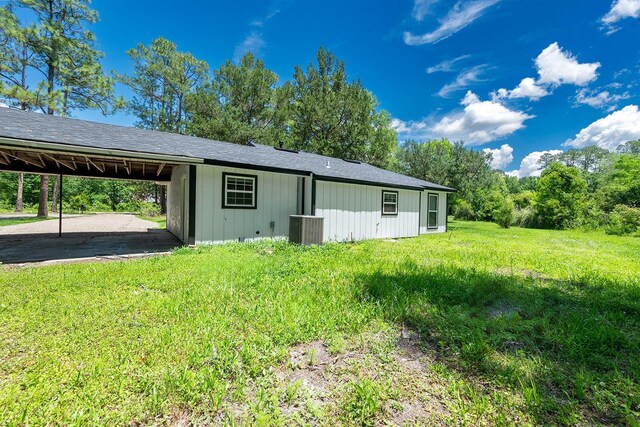 3046 SE 134th St, Starke, FL 32091 - exterior space with cooling unit and a carport