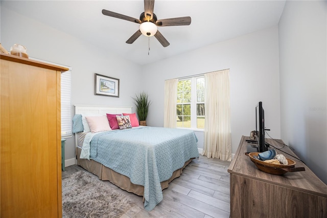 11001 225th Rd, Live Oak, FL 32060 - bedroom featuring light wood-type flooring, ceiling fan, and baseboards