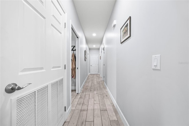 11001 225th Rd, Live Oak, FL 32060 - corridor with light wood-style floors, recessed lighting, and baseboards
