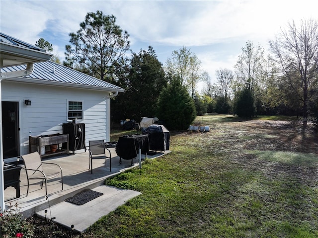 11001 225th Rd, Live Oak, FL 32060 - view of green lawn with a patio area