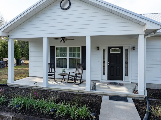 11001 225th Rd, Live Oak, FL 32060 - view of exterior entry featuring a porch and ceiling fan