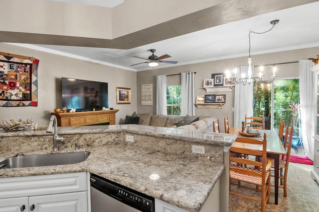 kitchen with a sink, dishwasher, open floor plan, a chandelier, and white cabinets