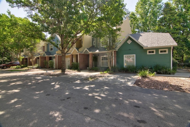 view of front of house featuring brick siding