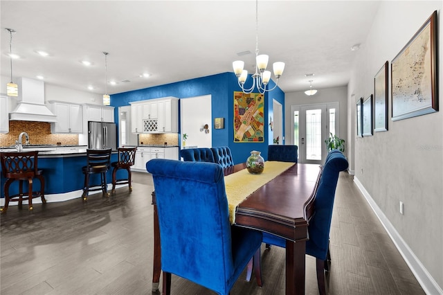 1084 NW 134th Way, Newberry, FL 32669 - dining room with dark wood-type flooring, a chandelier, baseboards, and recessed lighting