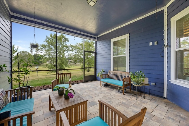 1084 NW 134th Way, Newberry, FL 32669 - sunroom / solarium with healthy amount of natural light and an outdoor living space