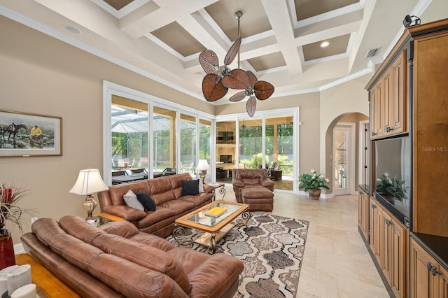 3533 SW 87th Dr, Gainesville, FL 32608 - living area with arched walkways, a ceiling fan, coffered ceiling, a high ceiling, and beam ceiling