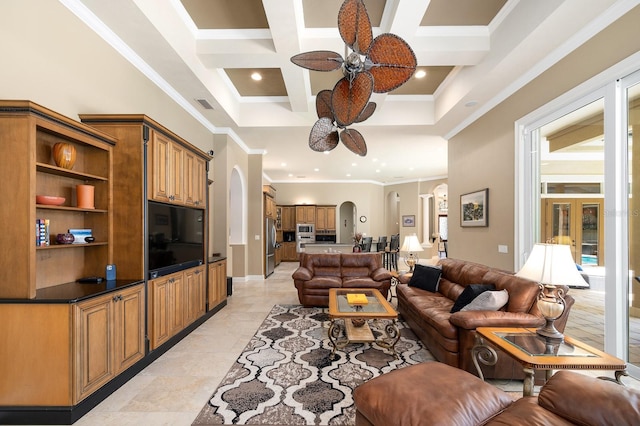 3533 SW 87th Dr, Gainesville, FL 32608 - living area with arched walkways, a ceiling fan, coffered ceiling, baseboards, and ornamental molding