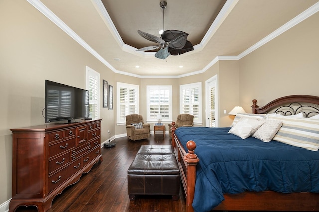 3533 SW 87th Dr, Gainesville, FL 32608 - bedroom with a raised ceiling, dark wood-style flooring, ornamental molding, recessed lighting, and baseboards