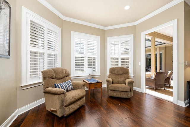 3533 SW 87th Dr, Gainesville, FL 32608 - sitting room featuring dark wood-style floors, ornamental molding, and baseboards