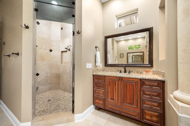 3533 SW 87th Dr, Gainesville, FL 32608 - bathroom with a shower stall, vanity, and baseboards