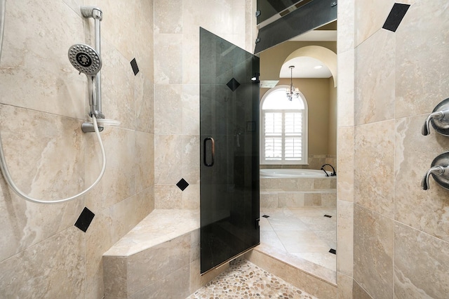 3533 SW 87th Dr, Gainesville, FL 32608 - bathroom featuring tiled shower and a garden tub